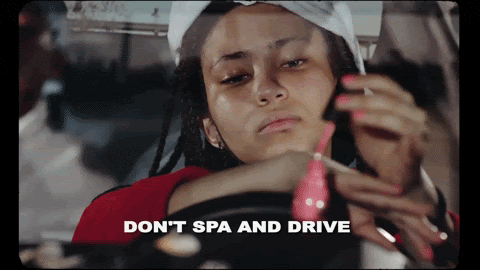 girls painting nails and doing hair while driving