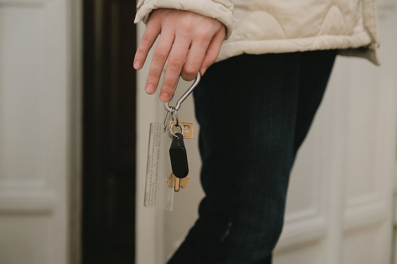 person holding keys